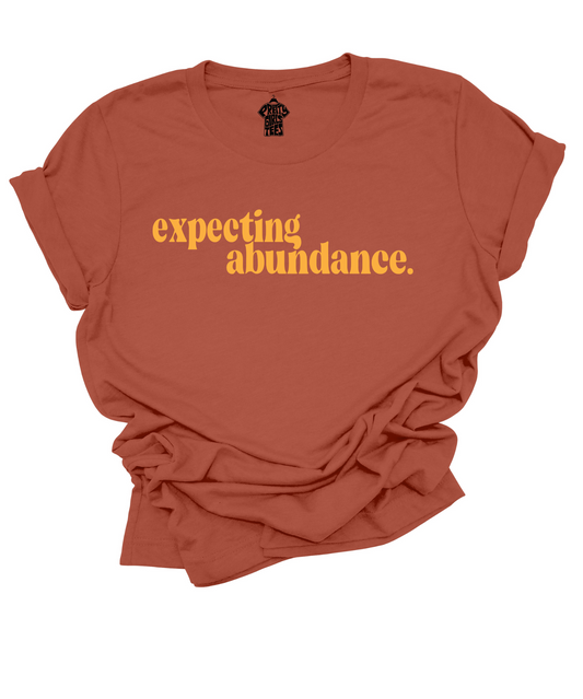 EXPECTING ABUNDANCE